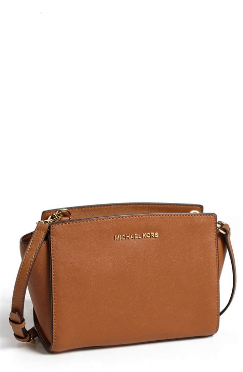 michael kors selma messenger medium brown crossbody bags|selma saffiano leather crossbody bag.